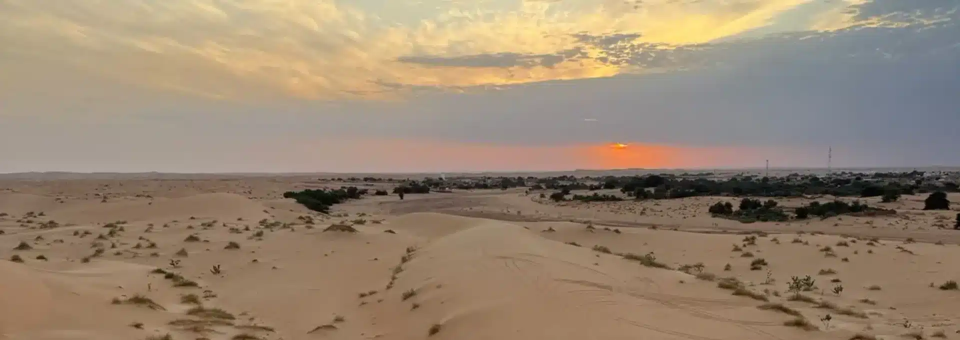 Adrar Mauritania tourTour: Golden sand dunes surrounding the ancient city of Chinguetti in the Mauritanian Sahara